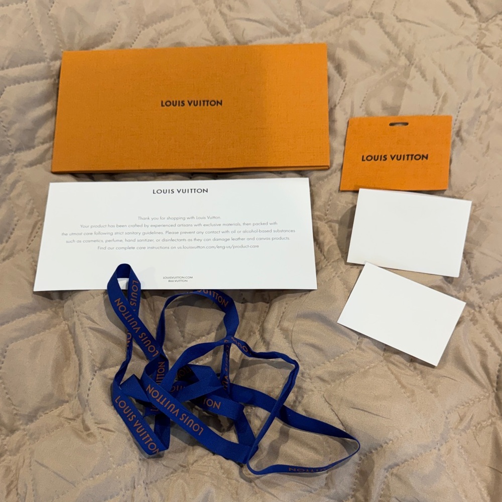 Louis Vuitton Orange Envelope with Blue Branded Ribbon